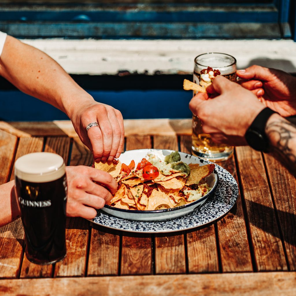 Couple eating nachos